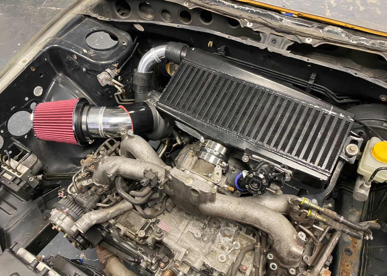 Rotated turbo top mount kit